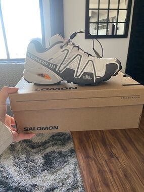 Salomon Men's Trail Runner in White and Black with Orange Accent